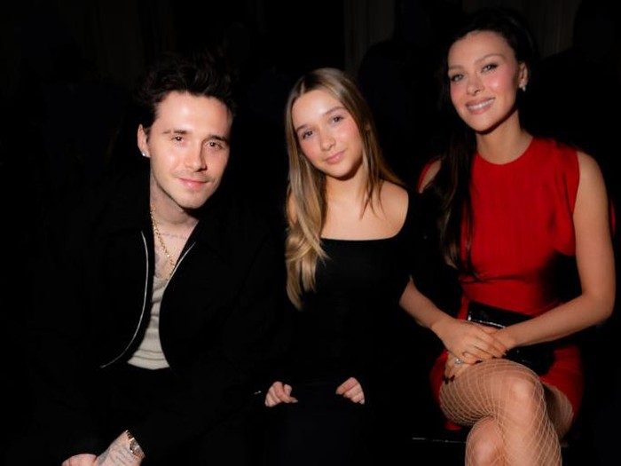 Brooklyn Beckham, Harper Beckham, and Nicola Peltz Beckham at Victoria Beckham RTW Fall 2024 as part of Paris Ready to Wear Fashion Week held at Hôtel Salomon de Rothschild on March 1, 2024 in Paris, France. (Photo by Lodovico Colli di Felizzano/WWD via Getty Images)