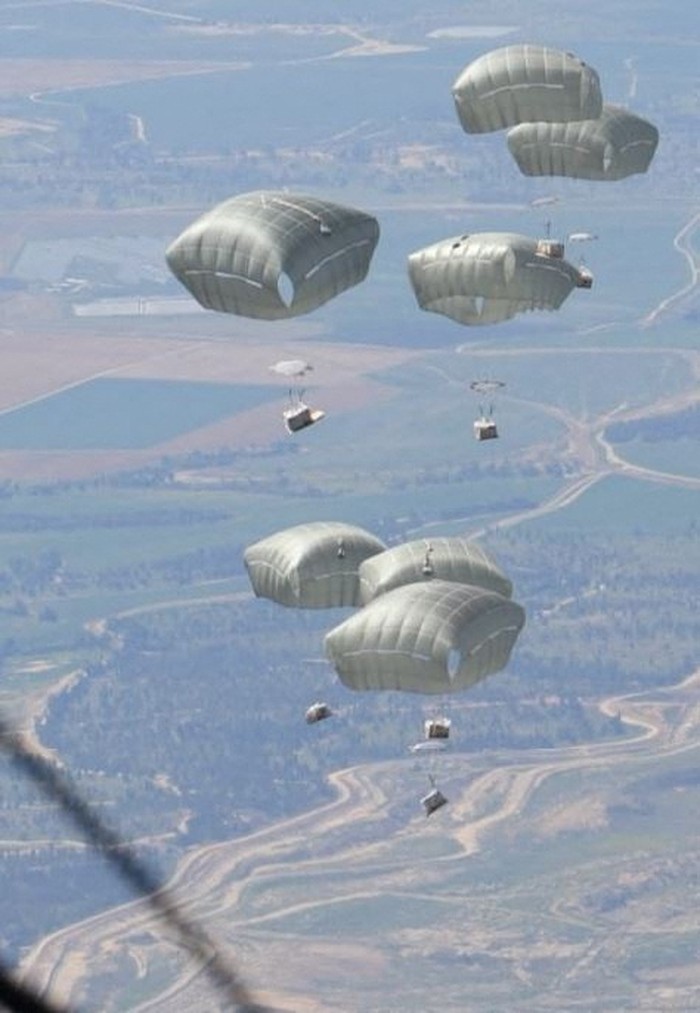A picture released on March 5, 2024, by the Jordanian Armed Forces website shows what it said was  aid parcels to be air-dropped to Gaza, in an operation it said was being carried out with the participation of the United States, Egypt and France, in Zarqa, Jordan. Jordan Armed Forces/Handout via REUTERS ATTENTION EDITORS - THIS IMAGE WAS PROVIDED BY A THIRD PARTY NO RESALES. NO ARCHIVES.