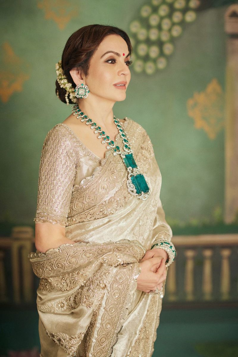 Gaya Nita Ambani In this photograph released by the Reliance group, Nita Ambani, wife of billionaire industrialist Mukesh Ambani' poses wearing a Kanchipuram sari, handcrafted by weavers from South India, at a pre-wedding bash of their son Anant Ambani in Jamnagar, India, Sunday, March 3, 2024. (Reliance group via AP)