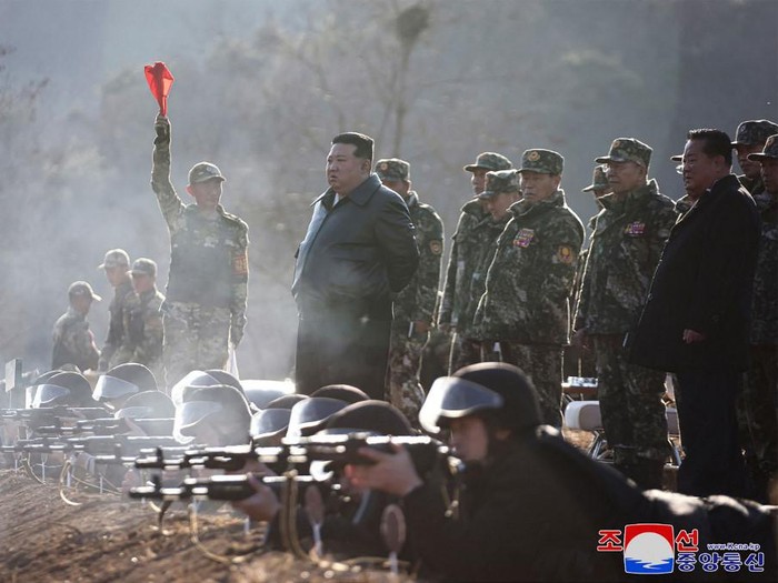 This picture taken on March 6, 2024 and released by North Koreas official Korean Central News Agency (KCNA) on March 7 shows North Korean leader Kim Jong Un (C) inspecting a major operational training base in the western area of the Korean Peoples Army (KPA) at an undisclosed location in North Korea. (Photo by KCNA VIA KNS / AFP) / - South Korea OUT / ---EDITORS NOTE--- RESTRICTED TO EDITORIAL USE - MANDATORY CREDIT 