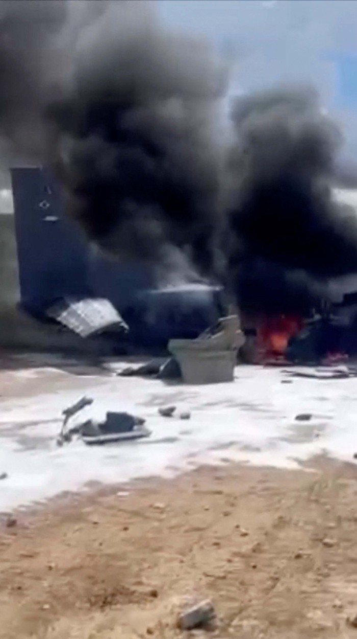 Rescuers work at the site of the crash of a single-engine plane at Pampulha Airport, in Belo Horizonte, Brazil March 6, 2024, in this screengrab taken from a handout video. Corpo De Bombeiros Militar De Minas Gerais/Handout via REUTERS    THIS IMAGE HAS BEEN SUPPLIED BY A THIRD PARTY. NO RESALES. NO ARCHIVES. MANDATORY CREDIT
