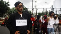 Aksi teatrikal ini untuk memperingati Hari Perempuan Internasional.