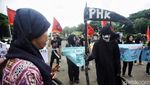 Aksi Teatrikal Buruh Peringati Hari Perempuan Sedunia di Patung Kuda