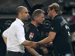 Guardiola yang masih melatih Bayern Munich berhadapan dengan Klopp yang menukangi Borussia Dortmund di Piala Super DFL, Juli 2013. Foto: Corbis via Getty Images/sampics