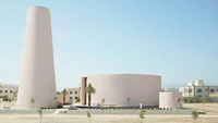Menara masjid yang berbentuk kerucut itu ada di Masjid Bab Al Salam yang berada di Muskat, Oman. Masjid tersebut didesain oleh studio arsitektur Altqadum yang mana terbentuk dari lima ruang geometris dan memiliki menara dengan bentuk kerucut. Masjid yang baru diresmikan di ibu kota Oman ini dirancang dengan bentuk kontemporer dan membuat keunikannya ini menjadi ciri khas kota tersebut. Foto: Firas Al Raisi via Dezeen