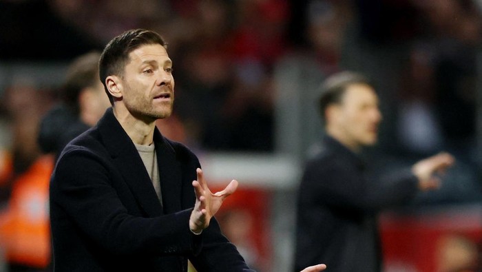 Soccer Football - Bundesliga - Bayer Leverkusen v VfL Wolfsburg - BayArena, Leverkusen, Germany - March 10, 2024 Bayer Leverkusen coach Xabi Alonso reacts REUTERS/Thilo Schmuelgen DFL REGULATIONS PROHIBIT ANY USE OF PHOTOGRAPHS AS IMAGE SEQUENCES AND/OR QUASI-VIDEO.