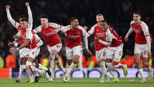 LONDON, ENGLAND - MARCH 12: The players of Arsenal celebrate as David Raya of Arsenal (not pictured) makes the match-winning save from the fourth penalty from Galeno of FC Porto (not pictured) in the penalty shoot out during the UEFA Champions League 2023/24 round of 16 second leg match between Arsenal FC and FC Porto at Emirates Stadium on March 12, 2024 in London, England. (Photo by Julian Finney/Getty Images)