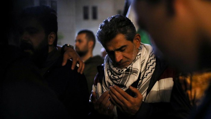 People take part in a protest in support of Palestinians in Gaza, amid the ongoing conflict between Israel and Palestinian Islamist group Hamas, during the holy month of Ramadan, in Amman, Jordan March 12, 2024. REUTERS/Alaa Al-Sukhni