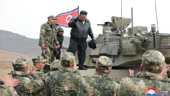 Momen Kim Jong-Un Kendarai Tank Baru Saat Latihan Militer Korut North Korean leader Kim Jong Un sits inside a tank during a military demonstration involving tank units, in North Korea, March 13, 2024 in this picture released on March 14, 2024, by the Korean Central News Agency. KCNA via REUTERS ATTENTION EDITORS - THIS IMAGE WAS PROVIDED BY A THIRD PARTY. REUTERS IS UNABLE TO INDEPENDENTLY VERIFY THIS IMAGE. NO THIRD PARTY SALES. SOUTH KOREA OUT. NO COMMERCIAL OR EDITORIAL SALES IN SOUTH KOREA. TPX IMAGES OF THE DAY