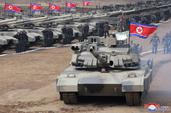 North Korean leader Kim Jong Un sits inside a tank during a military demonstration involving tank units, in North Korea, March 13, 2024 in this picture released on March 14, 2024, by the Korean Central News Agency.  KCNA via REUTERS    ATTENTION EDITORS - THIS IMAGE WAS PROVIDED BY A THIRD PARTY. REUTERS IS UNABLE TO INDEPENDENTLY VERIFY THIS IMAGE. NO THIRD PARTY SALES. SOUTH KOREA OUT. NO COMMERCIAL OR EDITORIAL SALES IN SOUTH KOREA.     TPX IMAGES OF THE DAY