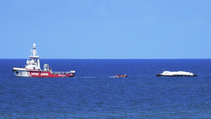 The Open Arms maritime vessel that set sail from Larnaca in Cyprus carrying humanitarian aid approaches the coast of Gaza City on March 15, 2024. The Open Arms, which the Spanish charity operating it says is carrying 200 tonnes of food for Gazans threatened with famine after more than five months of war via a new maritime corridor, was visible off the war-ravaged territory on March 15. (Photo by AFP)