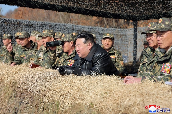 This picture taken on March 13, 2024 and released by North Koreas official Korean Central News Agency (KCNA) on March 14 shows North Korean leader Kim Jong Un (C) inspecting a training competition between the combined forces of the Korean Peoples Army tank crews at an undisclosed location in North Korea. (Photo by KCNA VIA KNS / AFP) / - South Korea OUT / ---EDITORS NOTE--- RESTRICTED TO EDITORIAL USE - MANDATORY CREDIT 