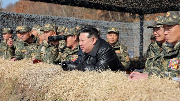 This picture taken on March 13, 2024 and released by North Korea's official Korean Central News Agency (KCNA) on March 14 shows North Korean leader Kim Jong Un (C) inspecting a training competition between the combined forces of the Korean People's Army tank crews at an undisclosed location in North Korea. (Photo by KCNA VIA KNS / AFP) / - South Korea OUT / ---EDITORS NOTE--- RESTRICTED TO EDITORIAL USE - MANDATORY CREDIT 