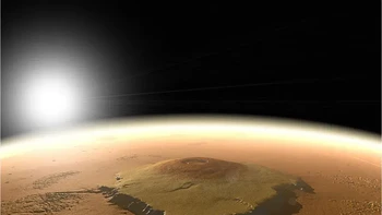 Gunung Mons adalah gunung berapi terbesar di Tata Surya kita, dan tertinggi di Mars. Foto: NASA via The Sun