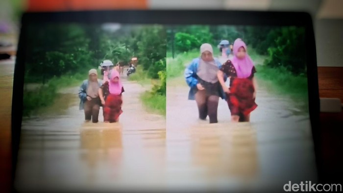 Video viral ibu muda terjang banjir Sukabumi
