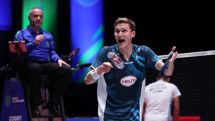 BIRMINGHAM, ENGLAND - MARCH 15: Viktor Axelsen of Denmark reacts to a line judges decision during the Mens Singles Quarter Final match against Anthony Sinisuka Ginting of Indonesia on Day Four of the Yonex All England Open Badminton Championships 2024 at Utilita Arena Birmingham on March 15, 2024 in Birmingham, England. (Photo by Catherine Ivill/Getty Images)