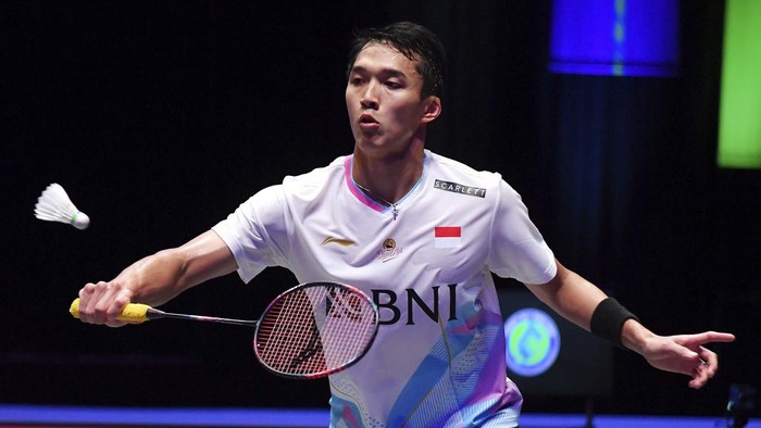 Indonesia's Jonatan Christie plays a shot during the men's singles semi final match against India's Lakshya Sen at the All England Open Badminton Championships at the Utilita Arena in Birmingham, England, Saturday, March 16, 2024. (AP Photo/Rui Vieira)