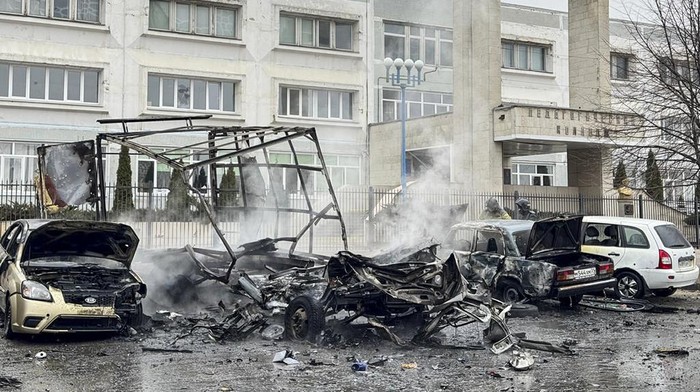 This photo released by Belgorod region governor Vyacheslav Gladkov's telegram channel on Saturday, March 16, 2024, shows a broken truck and a bus after shelling from the Ukrainian side in Belgorod, Russia. A Russian regional governor says two people have been killed in Ukrainian shelling of the city of Belgorod, close to the border with Ukraine. Three others were wounded. (Belgorod region governor Vyacheslav Gladkov telegram channel via AP)
