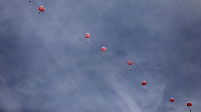 Humanitarian aid is airdropped to Palestinians in Gaza City, Gaza Strip, on Sunday, March 17, 2024. (AP Photo/Mohammed Hajjar)