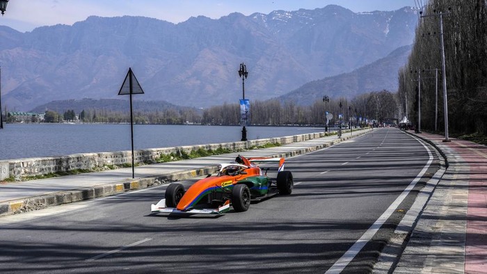 A car competes in a race during a motorsport event organized to boost adventure tourism in the region, in Srinagar, Indian controlled Kashmir, Sunday, March 17, 2024. (AP Photo/Mukhtar Khan)