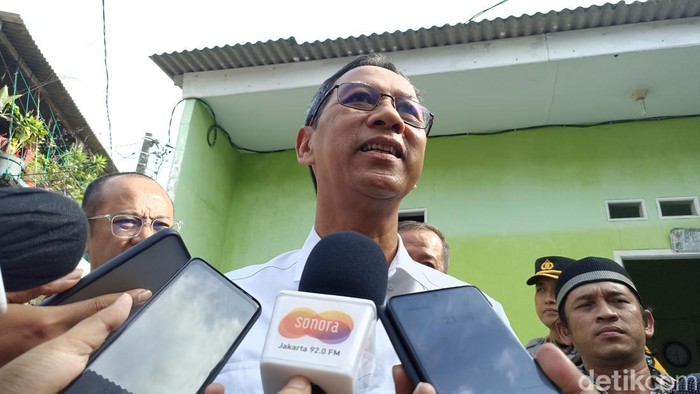 Ancaman Tindakan Tegas Heru Budi Hartono terhadap RT yang Terima Setoran Juru Parkir Liar