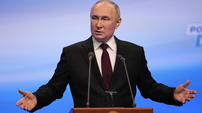 Russian President Vladimir Putin speaks on a visit to his campaign headquarters after a presidential election in Moscow, early Monday, March 18, 2024. (AP Photo/Alexander Zemlianichenko)