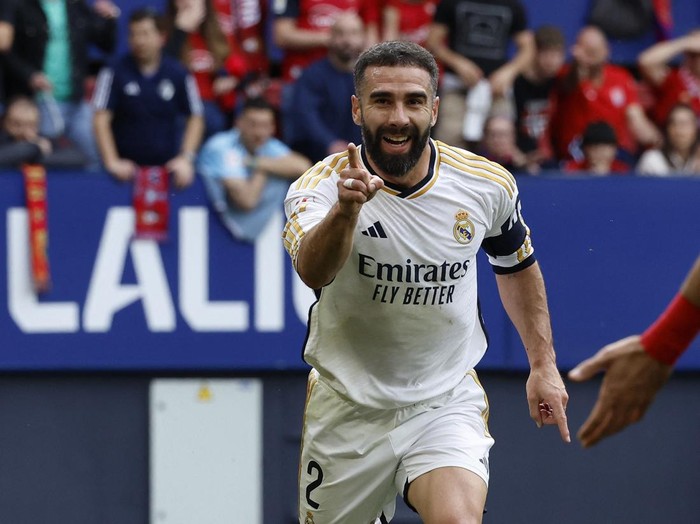 Soccer Football - LaLiga - Osasuna v Real Madrid - El Sadar Stadium, Pamplona, Spain - March 16, 2024 Real Madrid's Dani Carvajal celebrates scoring their second goal REUTERS/Vincent West