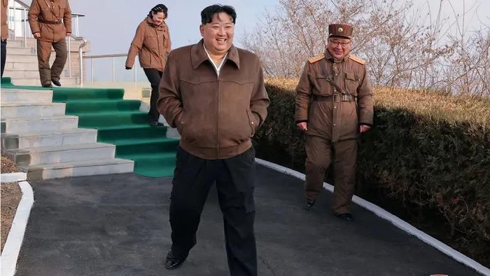 North Korean leader Kim Jong-un attends a ground test of a solid-fuel engine for a new type of intermediate-range hypersonic missile as part of a program of developing national defense capability, at an unknown location in North Korea, March 19, 2024. (KCNA via Reuters)