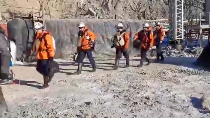 Rescuers arrive for search and rescue operations at the Pioneer gold mine, where miners were trapped after a rock fall, in the Amur Region, Russia March 19, 2024, in this still image taken from video. Russian Emergencies Ministry/Handout via REUTERS ATTENTION EDITORS - THIS IMAGE WAS PROVIDED BY A THIRD PARTY. NO RESALES. NO ARCHIVES. MANDATORY CREDIT.