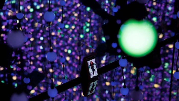 People attend a media presentation of the new Museo de la Luz (Museum of Light), which displays installations in which light is the main, if not the sole medium of creation, before its inauguration in Madrid, Spain, March 20, 2024. REUTERS/Susana Vera