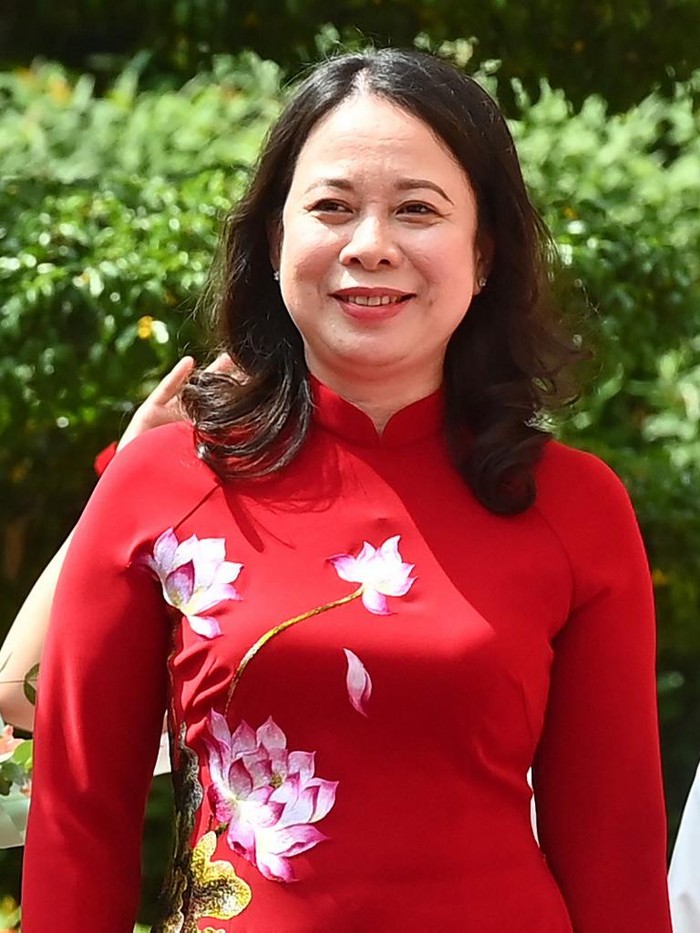 (FILES) Vietnams Vice President Vo Thi Anh Xuan looks on during a visit by Japans Crown Prince Akishino and Crown Princess Kiko at the Presidential Palace in Hanoi on September 21, 2023. Vietnams Vice President Vo Thi Anh Xuan is expected to take over the presidency until a permanent replacement is found, after the ruling Communist Party announced on March 20, 2024, that Vietnams President Vo Van Thuong had resigned, as the country mounts a sweeping anti-graft purge. (Photo by Giang HUY / AFP)