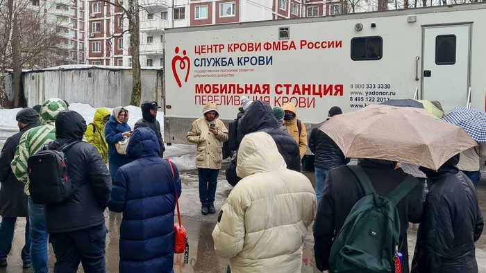 People lineup to donate blood to help victims of the attack in Crocus City Hall, near the Blood Center of the Federal Medical and Biological Agency, in Moscow, Russia, Saturday, March 23, 2024. Over 90 people were killed, including three children, authorities said. (Denis Voronin/Moscow News Agency via AP)