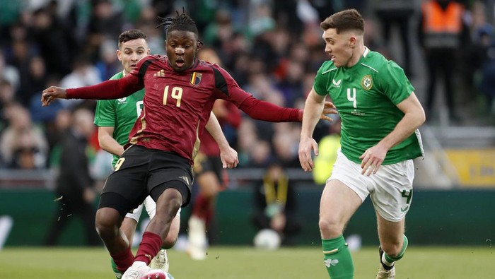 Belgiums Johan Bakayoko controls the ball during the international friendly soccer match between Ireland and Belgium at the Aviva Stadium in Dublin, Ireland, Saturday, March 23, 2024. (AP Photo/Peter Morrison)