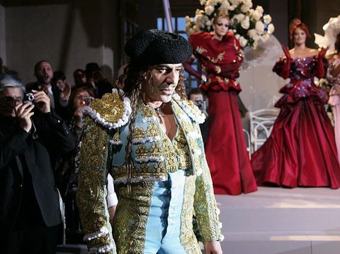 British designer John Galliano with his models on the catwalk at the Christian Dior 