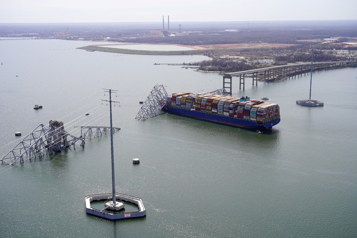Aerial view of the Dali cargo vessel which crashed into the Francis Scott Key Bridge, causing it to collapse in Baltimore, Maryland, U.S., March 26, 2024. Maryland National Guard/Handout via REUTERS. THIS IMAGE HAS BEEN SUPPLIED BY A THIRD PARTY