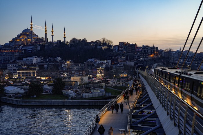 Ferry boats sail the Bosphorus connecting the European side, up and bottom, with the Asian side, top right, of Istanbul, Turkey, Wednesday, March 6, 2024. (AP Photo/Emrah Gurel)