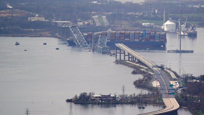 View of the Dali cargo vessel which crashed into the Francis Scott Key Bridge causing it to collapse in Baltimore, Maryland, U.S., March 26, 2024. REUTERS/Nathan Howard