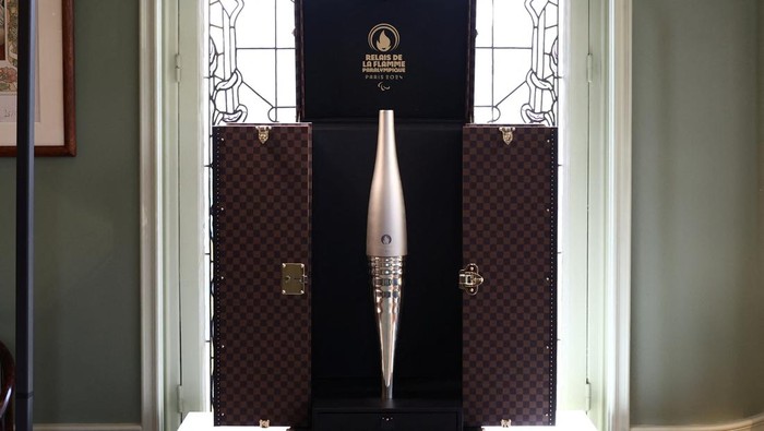 The Louis Vuitton Torch Trunk, which will transport and protect the torch during the Paris 2024 Olympic and Paralympic Games, is presented during a press visit at the Louis Vuitton workshops in Asnieres-sur-Seine near Paris, France, March 27, 2024. REUTERS/Stephanie Lecocq