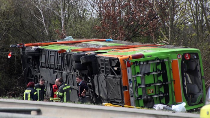 Emergency staff talk at the scene after several people were killed and more injured in a coach crash on the A9 motorway off Schkeuditz, near the eastern German city of Leipzig, Germany, March 27, 2024.    REUTERS/Marvin Matzulla/Mitteldeutsche Zeitung