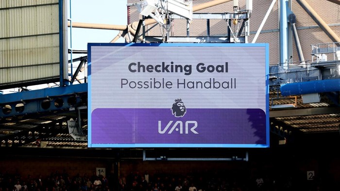 Soccer Football - Premier League - Chelsea v Burnley - Stamford Bridge, London, Britain - March 30, 2024 General view of the big screen during a VAR review before Chelseas Axel Disasi is disallowed REUTERS/Isabel Infantes NO USE WITH UNAUTHORIZED AUDIO, VIDEO, DATA, FIXTURE LISTS, CLUB/LEAGUE LOGOS OR LIVE SERVICES. ONLINE IN-MATCH USE LIMITED TO 45 IMAGES, NO VIDEO EMULATION. NO USE IN BETTING, GAMES OR SINGLE CLUB/LEAGUE/PLAYER PUBLICATIONS.