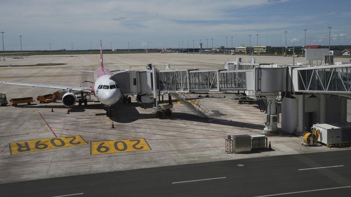 General view of the International Airport in Siem Reap province, Cambodia, Monday, April 1, 2024. The new airport can handle 7 million passengers a year, with plans to augment it to 12 million passengers annually from 2040. It was constructed under a 55-year build-operate-transfer (BOT) program between Cambodia and China. (AP Photo/Heng Sinith)