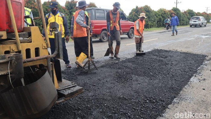 Perbaikan Jalan Nasional di Jambi Perbaikan Jalan Nasional di Jambi