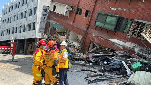 Firefighters work at the site where a building collapsed following the earthquake, in Hualien, Taiwan, in this handout provided by Taiwans National Fire Agency on April 3, 2024. Taiwan National Fire Agency/Handout via REUTERS  ATTENTION EDITORS - THIS IMAGE WAS PROVIDED BY A THIRD PARTY. NO RESALES. NO ARCHIVES.