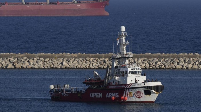 A ship belonging to the Open Arms aid group and is one of three ships loaded with canned food destined to Gaza, has returned to the Cypriot port of Larnaca, Cyprus, Wednesday, April 3, 2024. Cyprus, which has played a key role in setting up the maritime corridor, said the ships that had arrived Monday were returning to the Mediterranean island nation with some 240 tons of undelivered aid, after seven aid workers were killed. (AP Photo/Petros Karadjias)