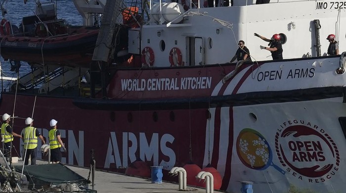 A ship belonging to the Open Arms aid group and is one of three ships loaded with canned food destined to Gaza, has returned to the Cypriot port of Larnaca, Cyprus, Wednesday, April 3, 2024. Cyprus, which has played a key role in setting up the maritime corridor, said the ships that had arrived Monday were returning to the Mediterranean island nation with some 240 tons of undelivered aid, after seven aid workers were killed. (AP Photo/Petros Karadjias)