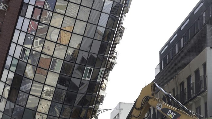 A building is seen partially collapsed, a day after a powerful earthquake struck the city, in Hualien City, eastern Taiwan, Thursday, April 4, 2024. (AP Photo/Chiang Ying-ying)