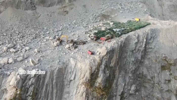 A drone view shows mine workers trapped in a landslide-struck mountainous area, following the earthquake, in Hualien, Taiwan, in this screengrab taken from a video obtained by Reuters on April 4, 2024.   CTS/Handout via REUTERS    THIS IMAGE HAS BEEN SUPPLIED BY A THIRD PARTY. NO RESALES. NO ARCHIVES. MANDATORY CREDIT. TAIWAN OUT. NO COMMERCIAL OR EDITORIAL SALES IN TAIWAN. DO NOT OBSCURE WATERMARK.