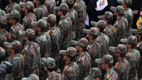 Iranian IRGC cadets attend the funeral of Razi Mousavi, a senior commander in the IRGC’s Quds Force who was killed on December 25 in an Israeli strike in Syria, in Tehran, on December 28, 2023. (AFP)