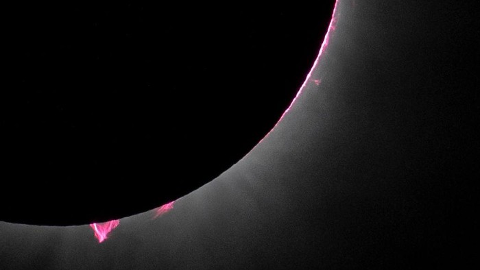 DALLAS, TX - APRIL 8:  (EDITOR’S NOTE: This handout image was provided by a third-party organization and may not adhere to Getty Images’ editorial policy) In this NASA handout, prominences from the sun are shown during a total solar eclipse that swept across a narrow portion of the North American April 8, 2024 as seen from Dallas, Texas. The eclipse could be seen from Mexicos Pacific coast to the Atlantic coast of Newfoundland, Canada. A partial solar eclipse was visible across the entire North American continent along with parts of Central America and Europe.  (Photo by Keegan Barber/NASA via Getty Images)