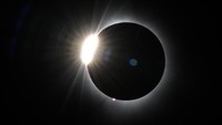 The moon covers most of the the sun as it approaches the total solar eclipse, as seen from the summit of Saddleback Mountain, Monday, April 8, 2024, near Rangeley, Maine. (AP Photo/Robert F. Bukaty)